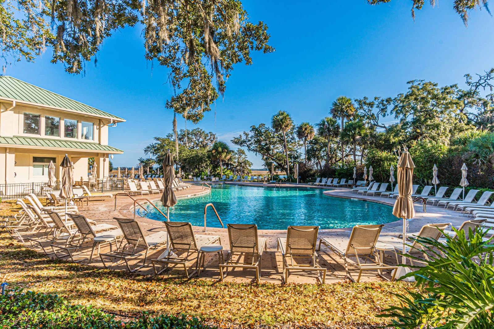 The Moss Creek community pool and clubhouse at ground level, overlooking the marsh