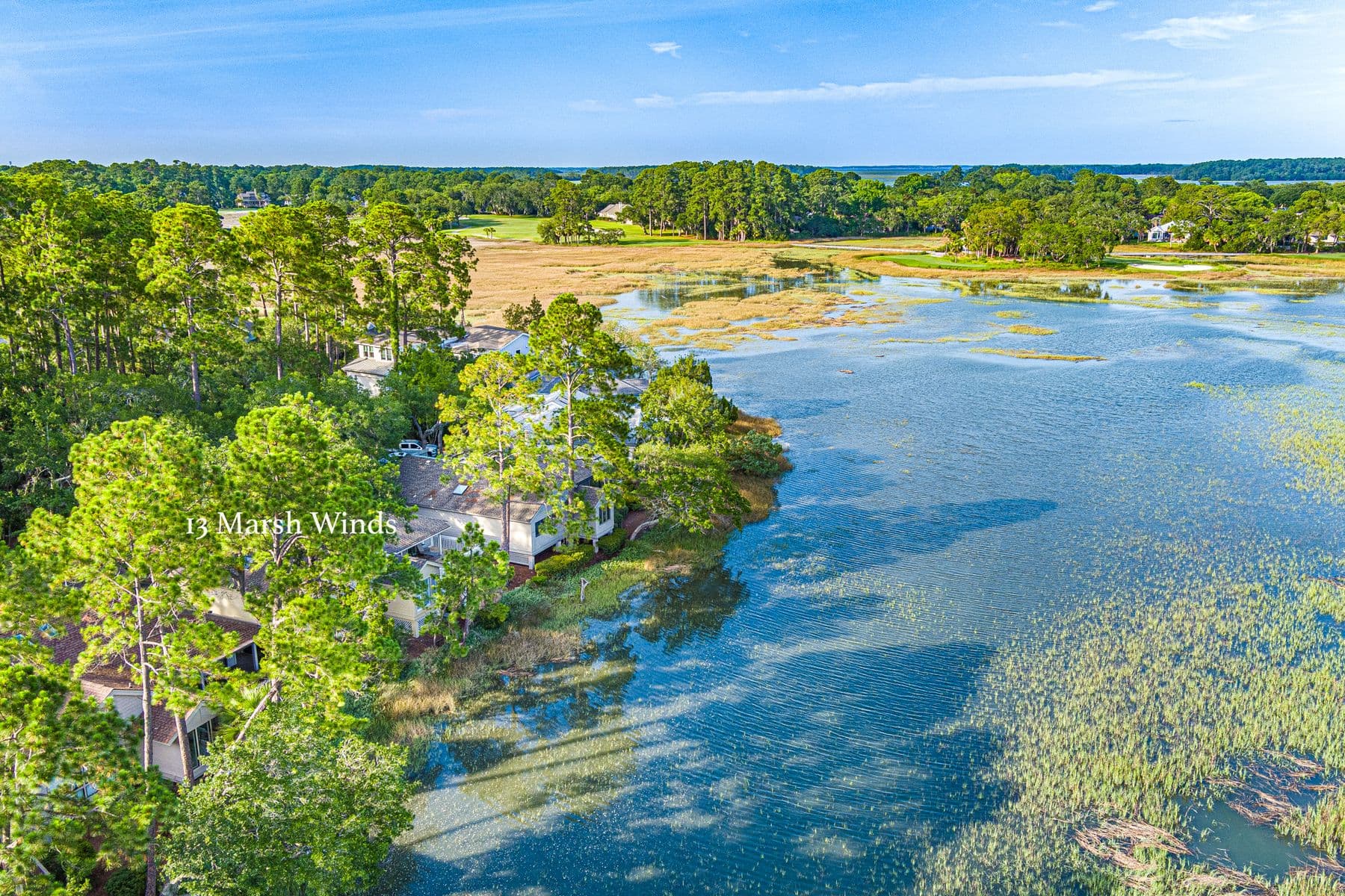 Aerial view of 13 Marsh Winds in Moss Creek, backing onto the tidal creek and nature preserve