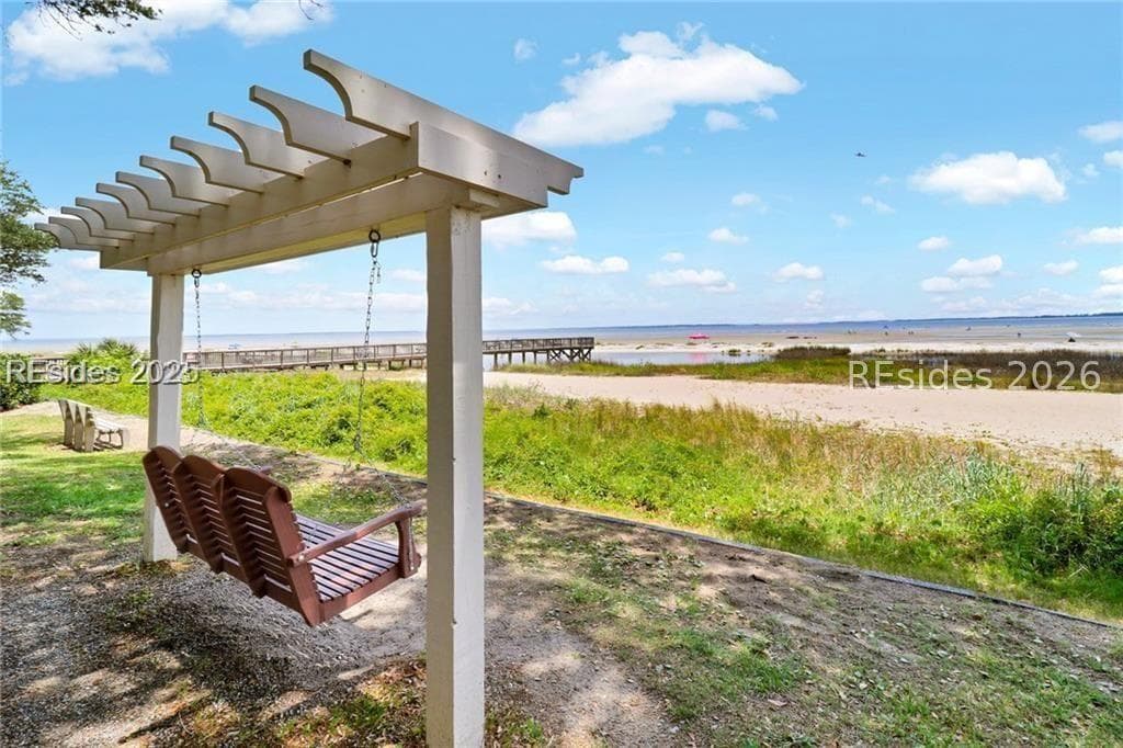The shared beachfront at 239 Beach City Road, Hilton Head Island, with a pergola and pier